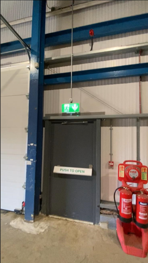 Commercial fire exit lighting and extinguishers installed by Fox Electrical